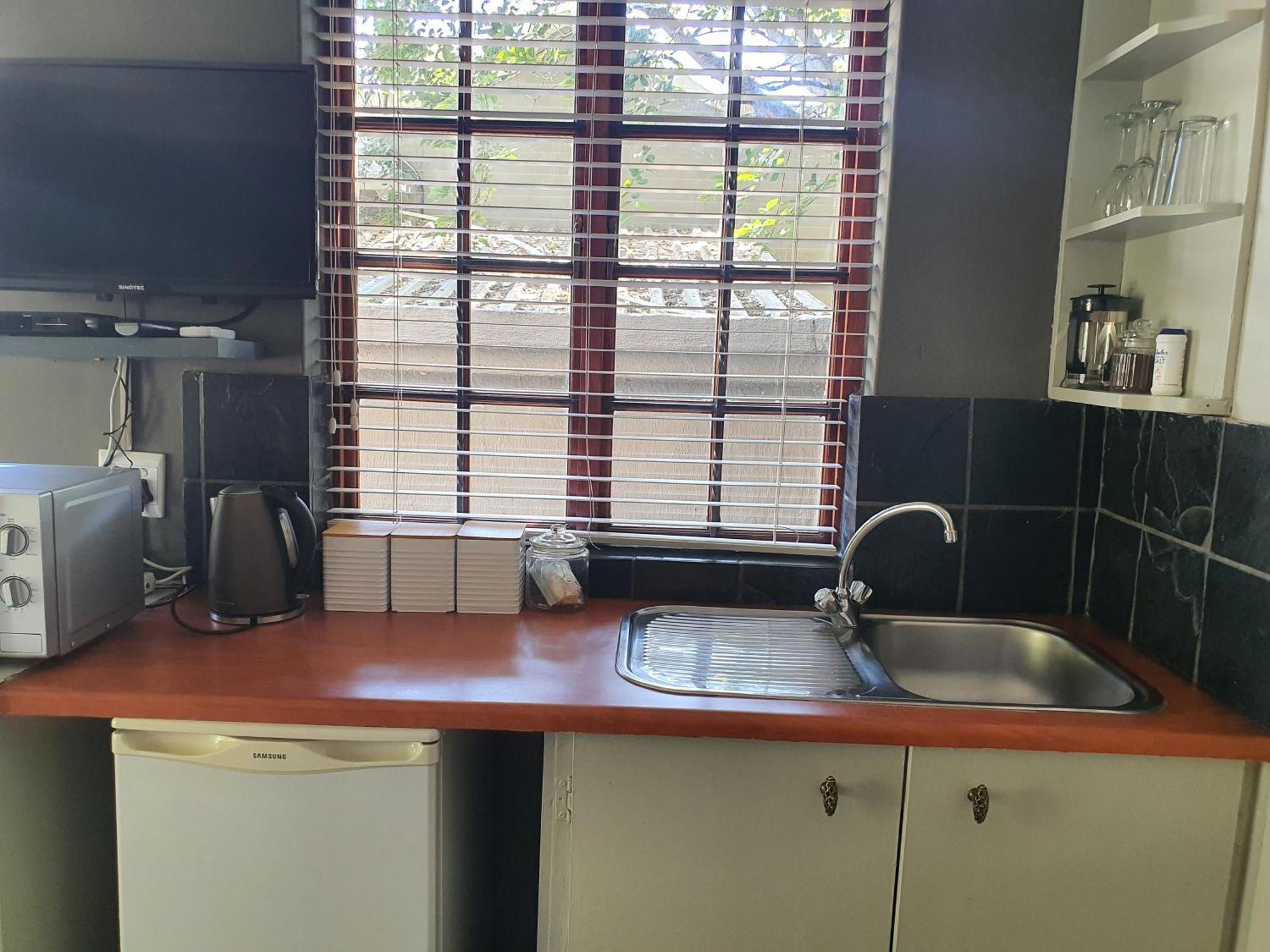 Waterhouse Guest Lodge In Muckleneuk Pretoria Quarto foto